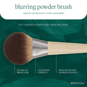EcoTools brush in use applying setting powder for even, blurred finish on skin