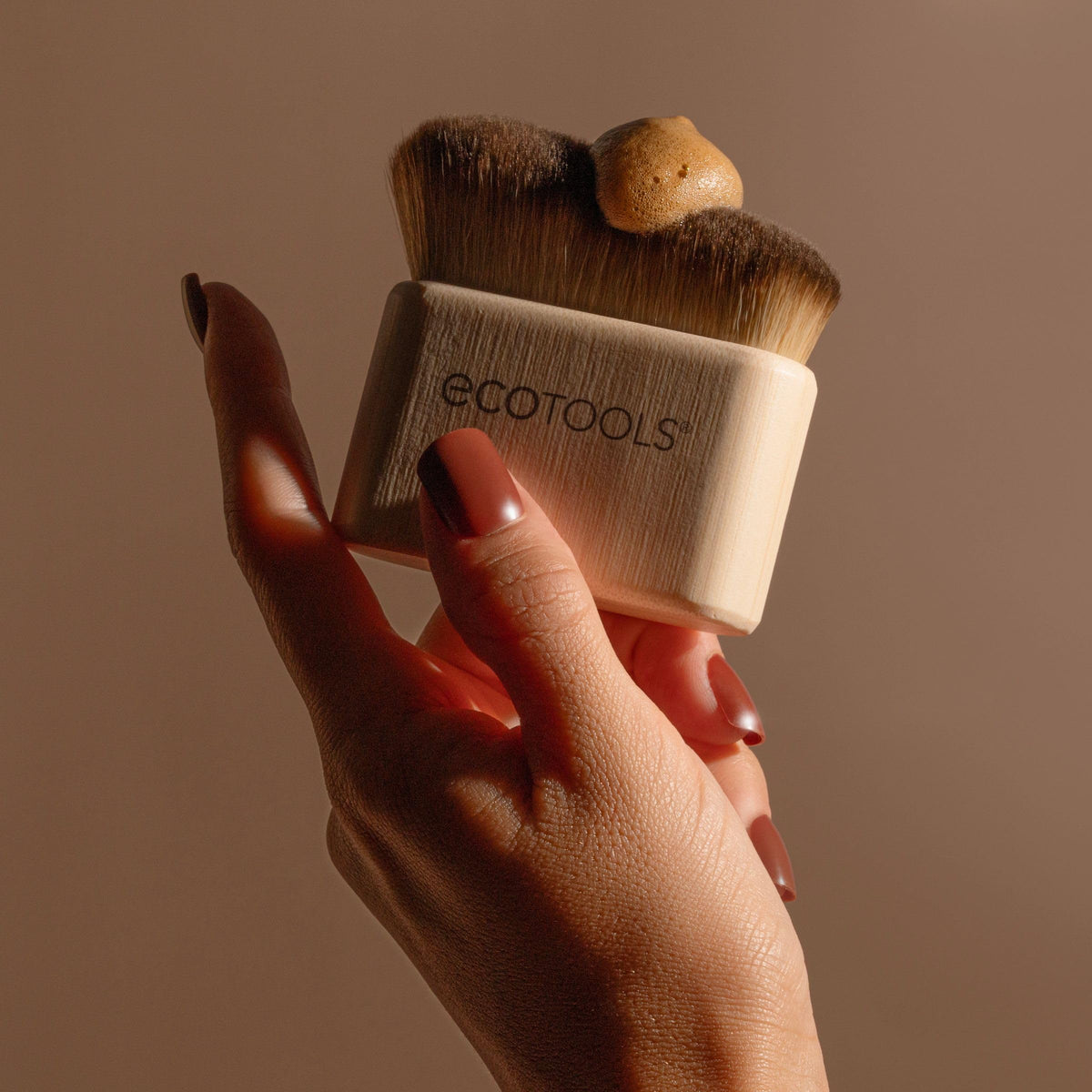 EcoTools Good Tan on bathroom vanity with tanning products for curated routine