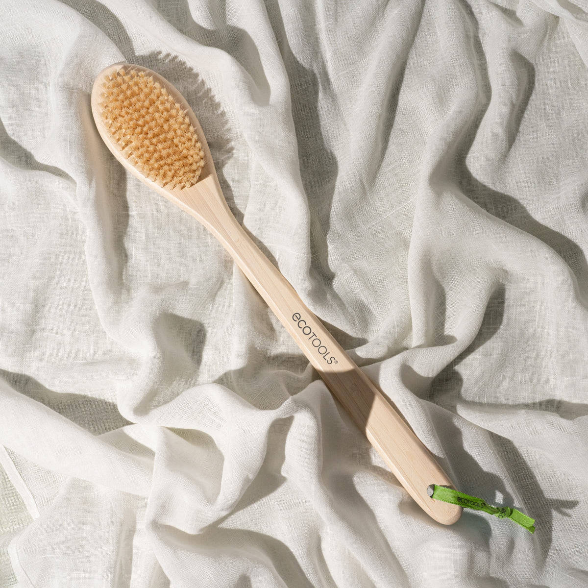 EcoTools hanging loop drying shot showing quick air-dry convenience