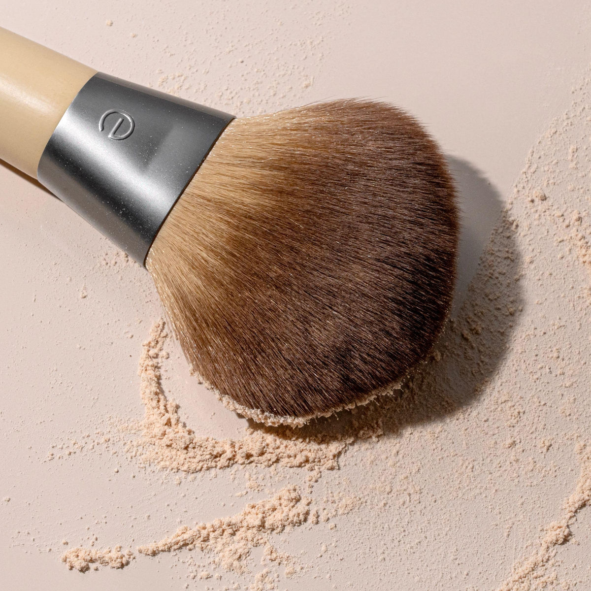 EcoTools brush on vanity in lifestyle setting showing eco-friendly beauty routine