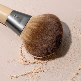 EcoTools brush on vanity in lifestyle setting showing eco-friendly beauty routine