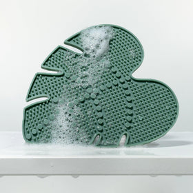 EcoTools pad used to cleanse makeup sponges showing gentle agitation and stain removal