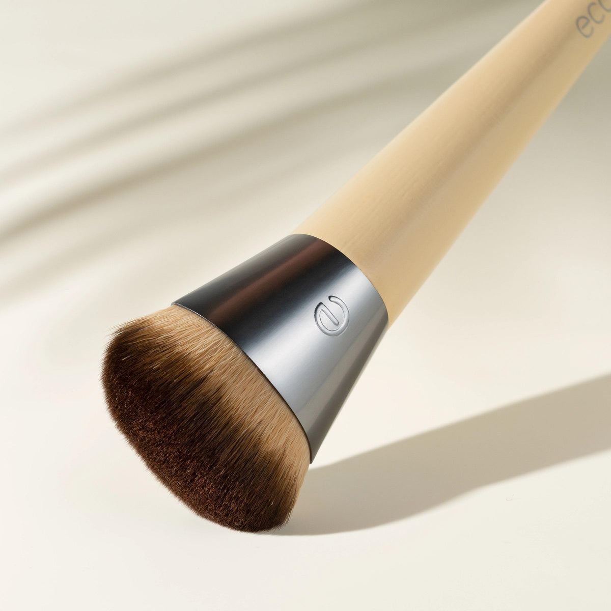 EcoTools bamboo handle detail showing renewable material and comfortable grip benefit