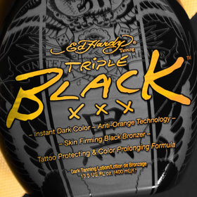Ed Hardy BLACK XXX applied on model showing deep immediate bronzing and tattoo protection