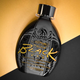 Ed Hardy BLACK XXX lotion texture on hand illustrating smooth silicone feel and fast spread
