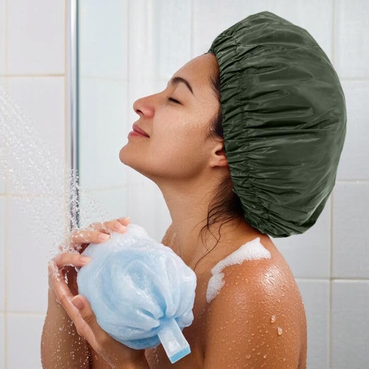 Edoneery cap on long braided hair displaying roomy, protective fit