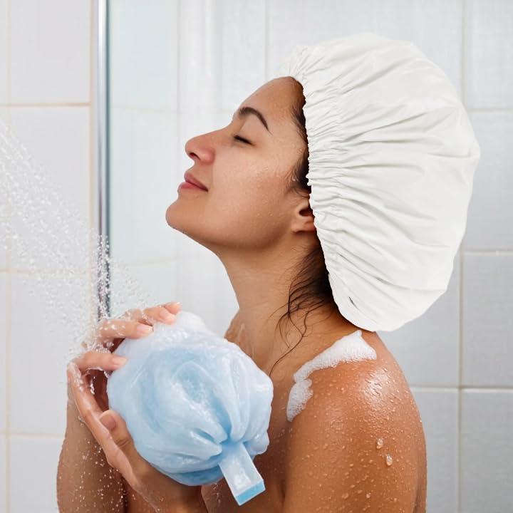 Edoneery cap in use with long curly hair illustrating roomy fit
