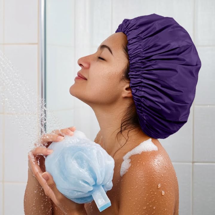 Edoneery shower cap worn by model with long hair keeping hair dry