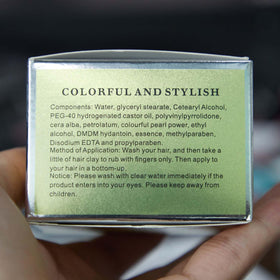 EFLY tin shown in hand to demonstrate compact travel-friendly size