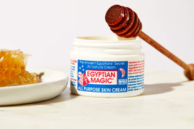 Egyptian Magic 1oz next to common items showing size and portability benefit