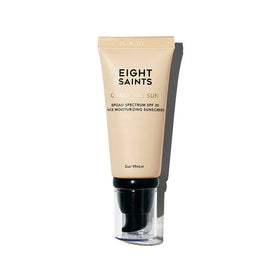 Eight Saints front tube shows SPF 30 and compact travel-ready benefits