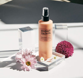 Eight Saints lotion texture on hand showing fast-absorbing benefit
