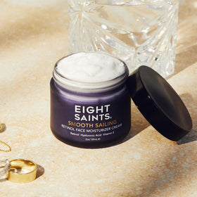 Eight Saints moisturizer in hand for size comparison and easy travel-friendly use