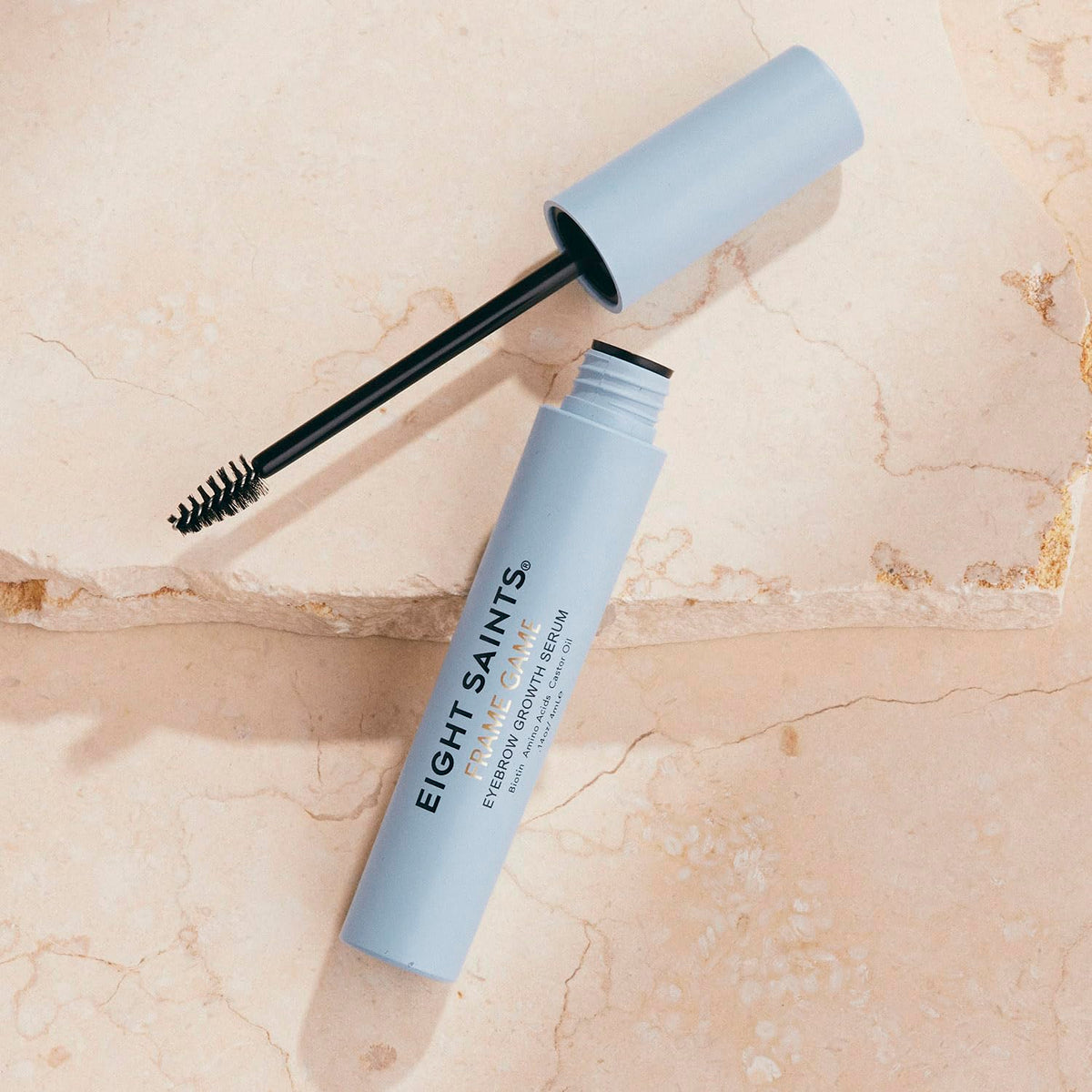Eight Saints serum texture on skin demonstrating lightweight absorbency benefit