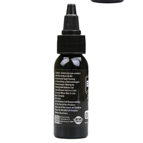 Element Nighthawk Black bottle beside ruler displaying 1oz size clarity