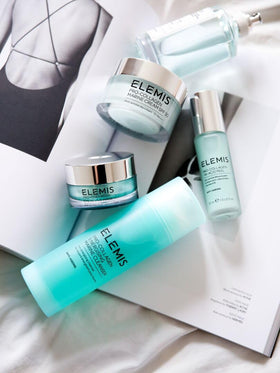 ELEMIS cleanser displayed in bathroom setting conveying refreshment and routine