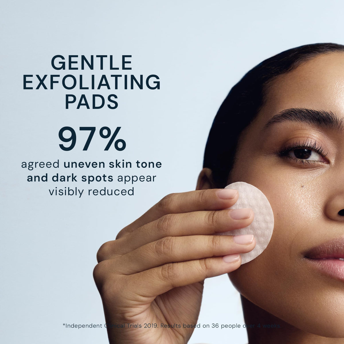 ELEMIS pad in hand demonstrating size and single-use hygiene benefit