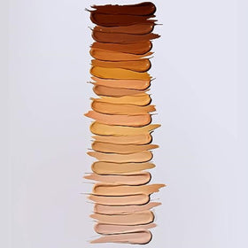 e.l.f. close-up spot conceal showing full coverage over blemish for natural finish