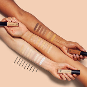 e.l.f. concealer being applied under-eye to brighten and conceal dark circles effectively