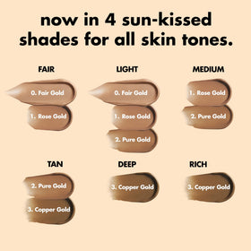 e.l.f. SKIN bronzing drops blended on collarbone to show all-over body glow