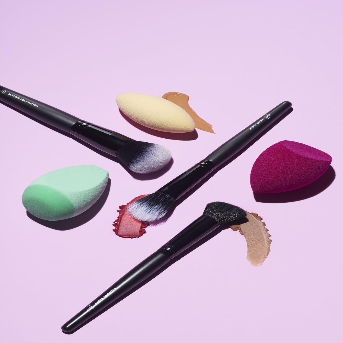 e.l.f. brush applying foundation on cheek for even, natural-looking coverage