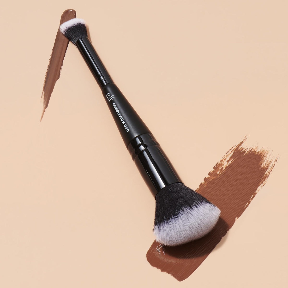 e.l.f. Complexion Duo Brush applying liquid foundation for an even airbrushed base