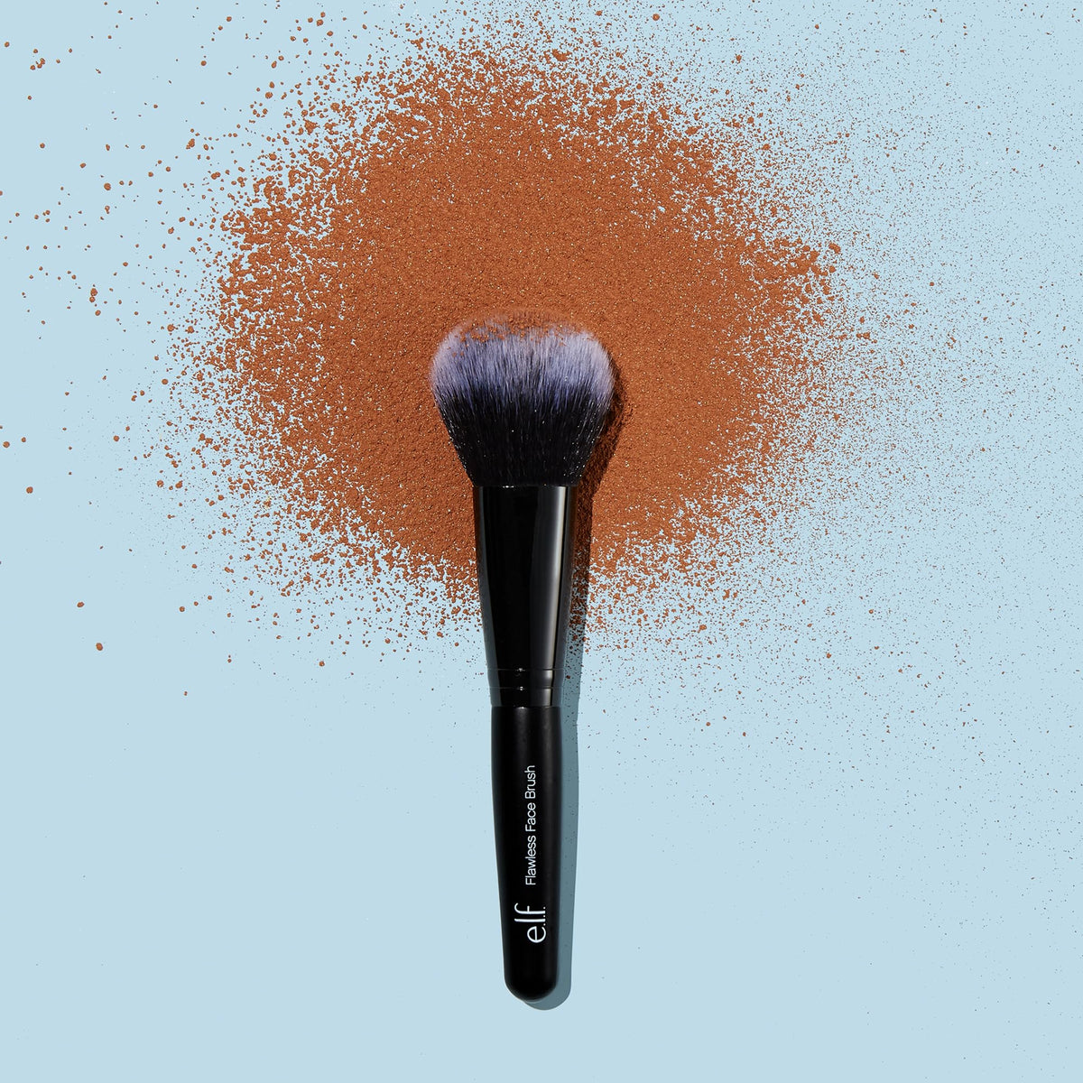 e.l.f. Flawless Face Brush applying bronzer on cheek to create natural, blended contour