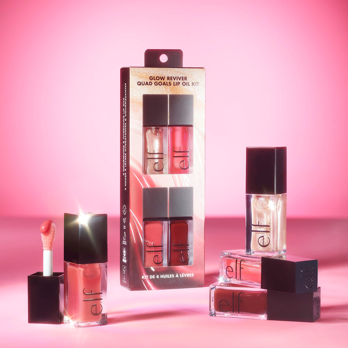 e.l.f. lip oil tubes beside a coin to show size and scale benefit: travel-friendly kit