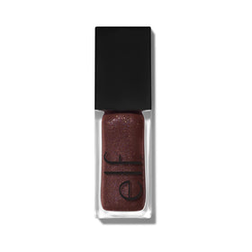 e.l.f. swatch on arm under light showing tint intensity and reflective shimmer
