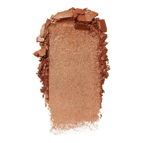 e.l.f. model wearing Coppertunist highlight for sun-kissed polished look