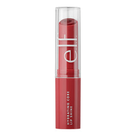 e.l.f. product next to standard lipstick shows compact, travel-friendly size