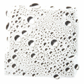 e.l.f. close-up of spray mist demonstrating fine even atomization benefit