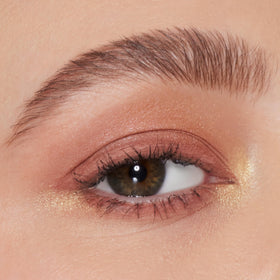 e.l.f. palette in hand showing compact size and travel-friendly benefit