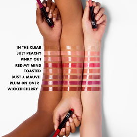 e.l.f. Pout Clout pen in hand demonstrating click-up applicator for precise on-the-go application