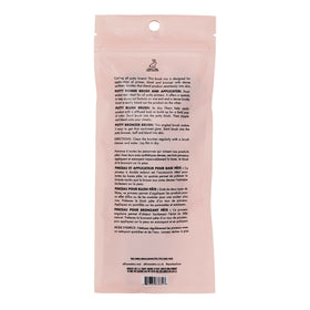 e.l.f. close-up of putty primer applicator bristles scooping product for precise placement