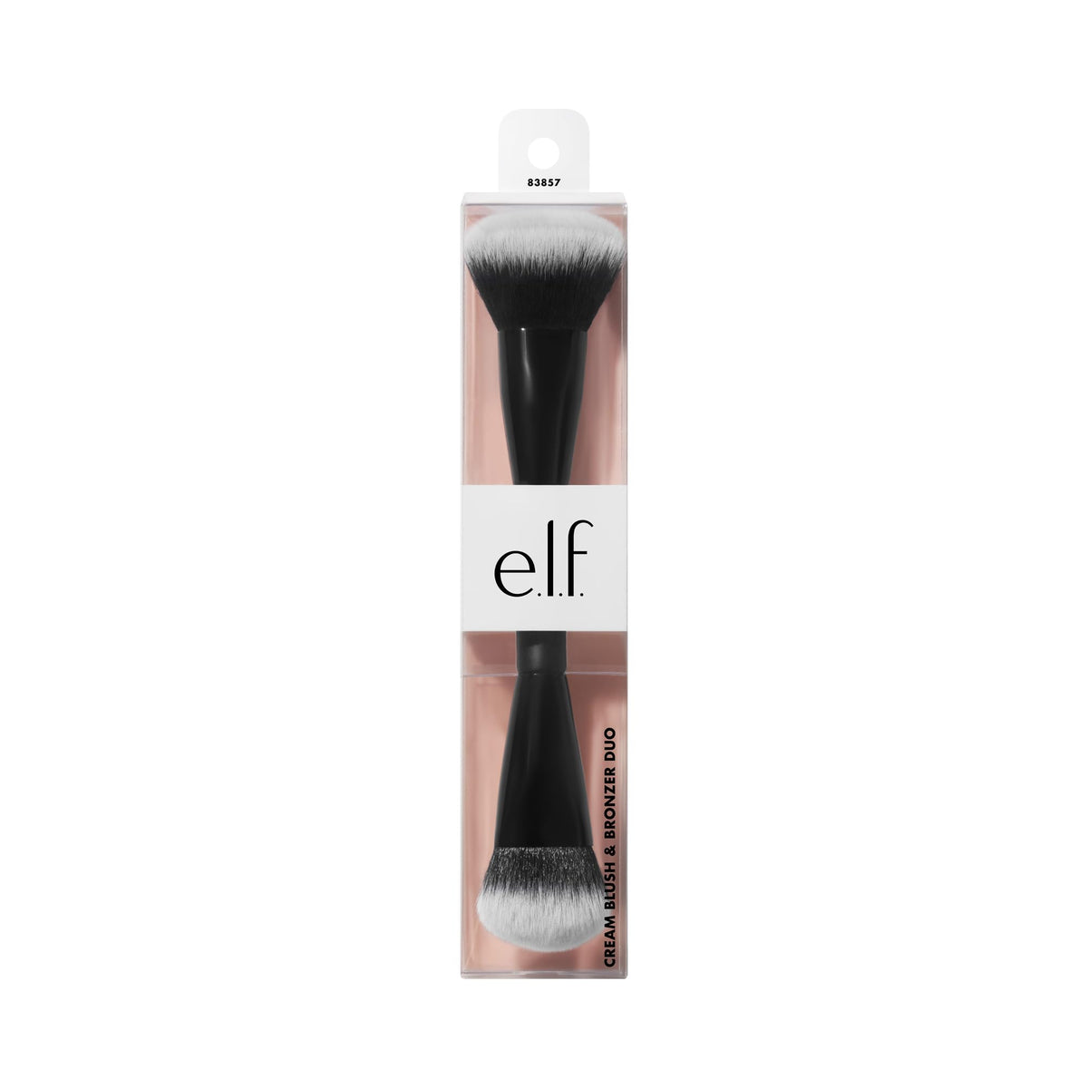 e.l.f. brush held in hand for scale showing travel-friendly compact size