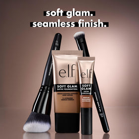e.l.f. Smooth Swipe applying liquid foundation to cheek for streak-free finish