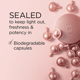 Elizabeth Arden capsules beside label highlighting key actives and clarity benefit