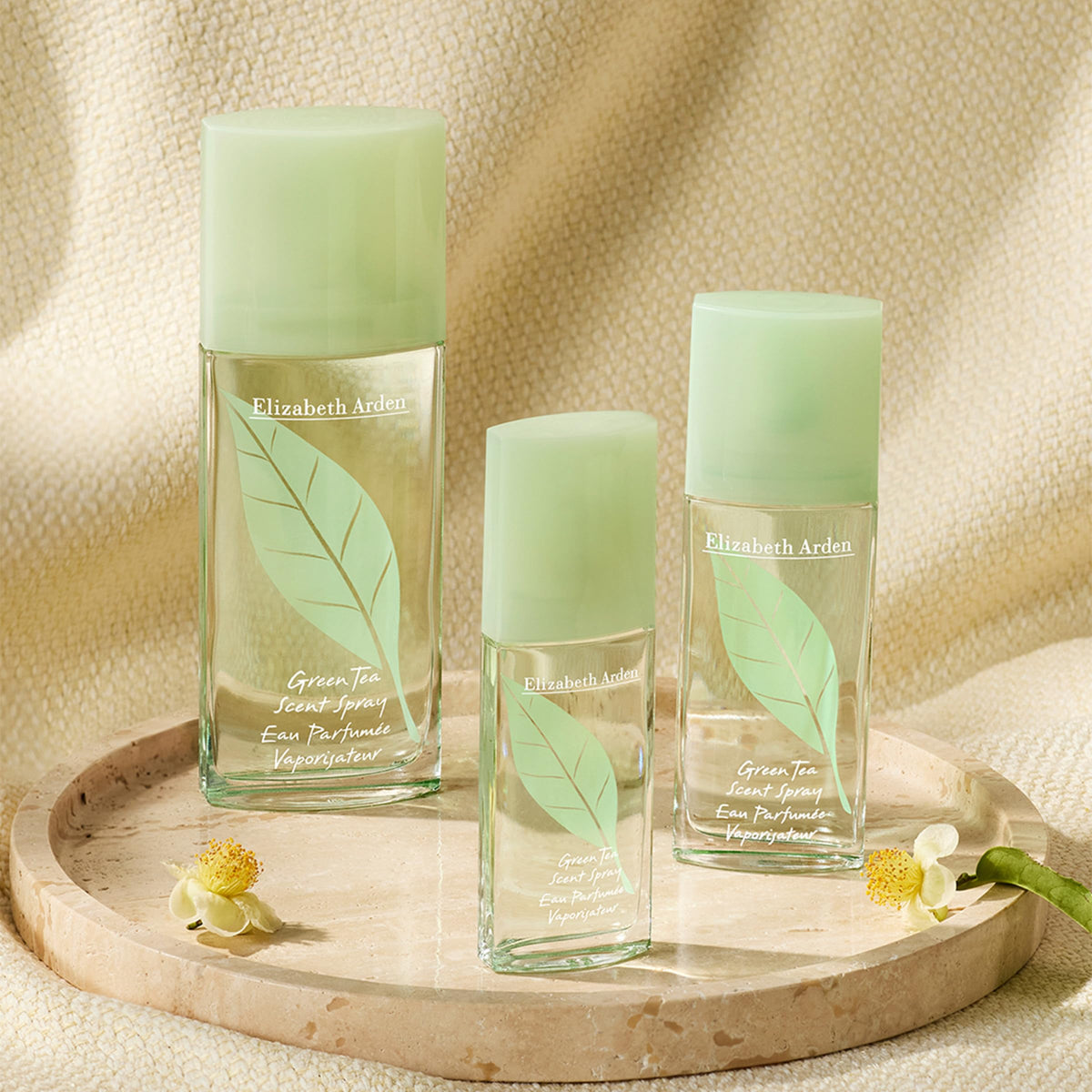 Elizabeth Arden spray in motion illustrating fine mist and instant uplifting scent release