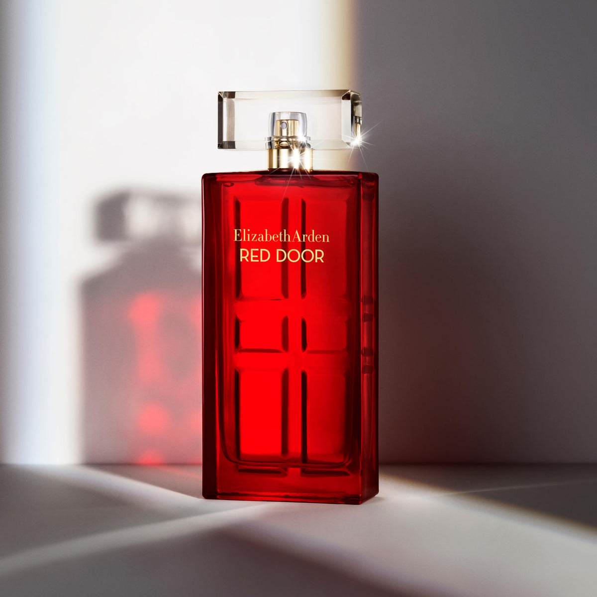 Elizabeth Arden Red Door bottle close-up showing textured door design and refinement