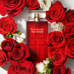 Elizabeth Arden Red Door held in hand to show 1.7 fl oz travel-friendly scale