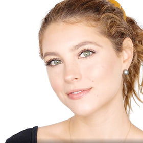 Elizabeth Mott bronzer being applied with brush for precise contouring benefit
