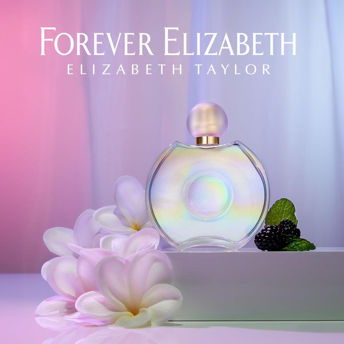 Elizabeth Taylor Forever spray in use creating a fine mist for long-lasting scent