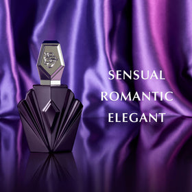 Elizabeth Taylor Passion bottle beside a hand for scale, shows compact 2.5 fl oz travel-friendly size