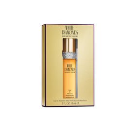 Elizabeth Taylor White Diamonds bottle close-up revealing glass detail and spray nozzle for quality feel