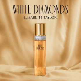 Elizabeth Taylor White Diamonds set on vanity with flowers evoking glamorous everyday use