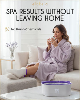 ELLA BELLA user dipping hand into warm wax for soothing treatment