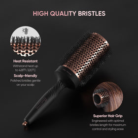 Ellen Evyse brush held in hand demonstrating ergonomic non-slip grip for comfortable styling