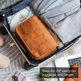 Elviros toiletry bag inside suitcase to show size comparison and travel efficiency benefit
