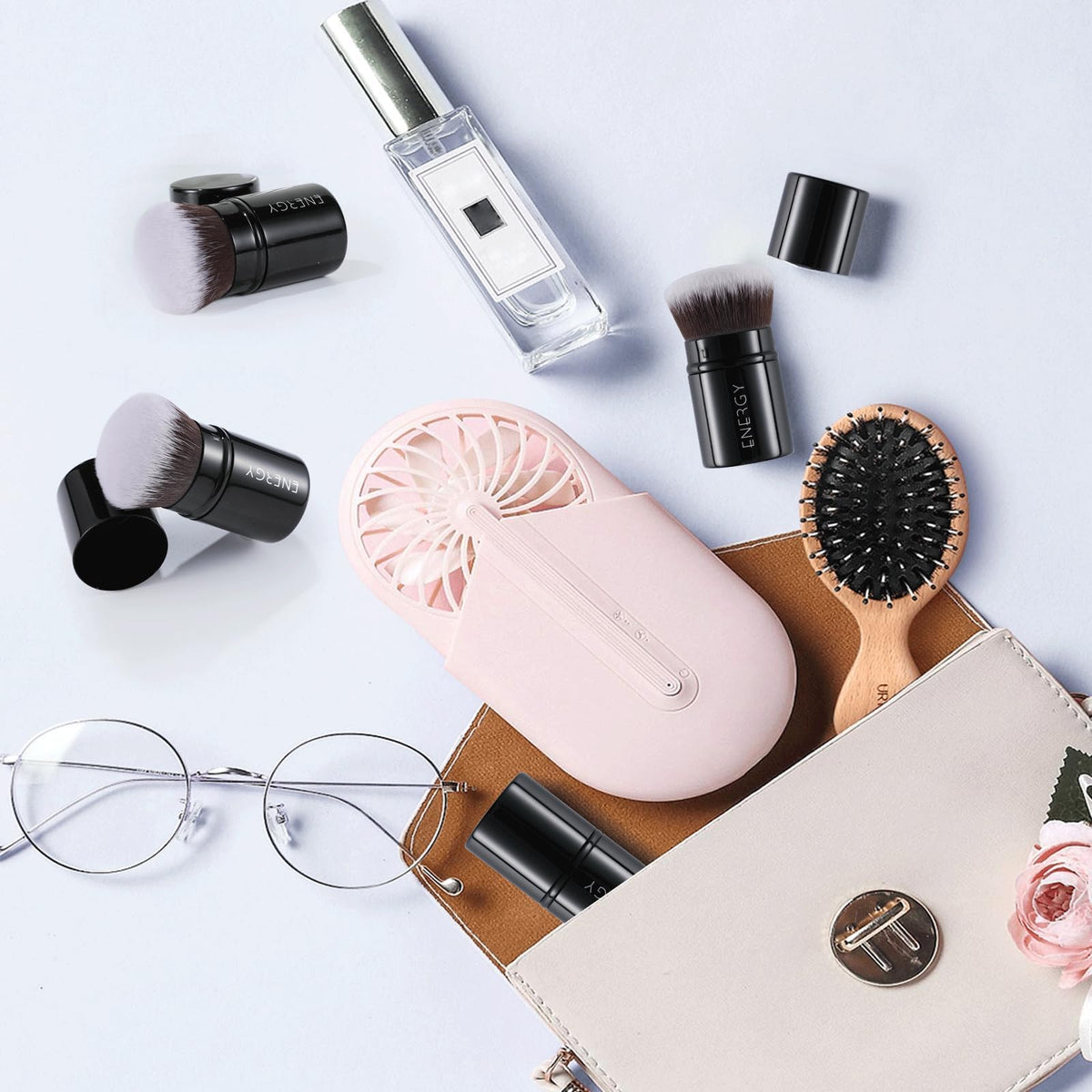 ENERGY kabuki brush applying liquid foundation for buffed, natural-looking coverage